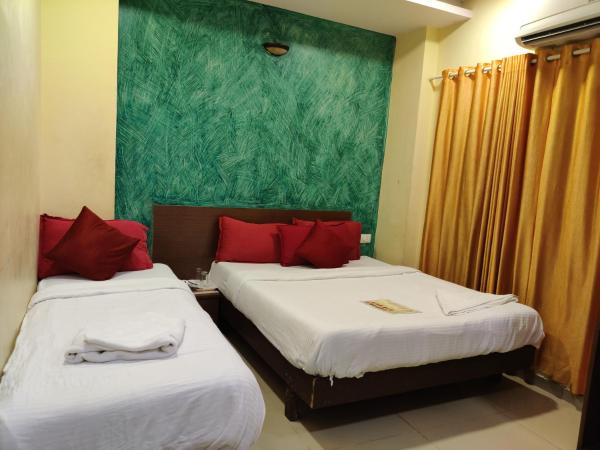 Hotel Golden Sagar : photo 4 de la chambre chambre triple deluxe
