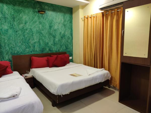 Hotel Golden Sagar : photo 5 de la chambre chambre triple deluxe