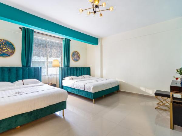 Summer Tree Inn (The Captain's Hostel) : photo 2 de la chambre chambre familiale deluxe