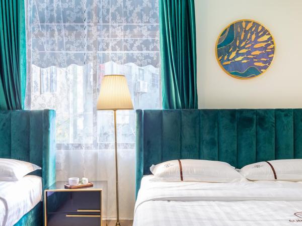 Summer Tree Inn (The Captain's Hostel) : photo 3 de la chambre chambre familiale deluxe