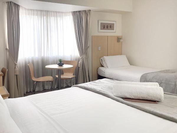 Airport Ascot Motel : photo 6 de la chambre chambre triple