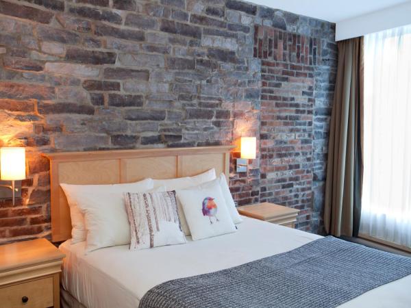 Hotel du Vieux Quebec : photo 4 de la chambre petite chambre lit queen-size