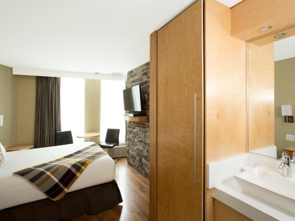 Hotel du Vieux Quebec : photo 2 de la chambre petite chambre lit queen-size
