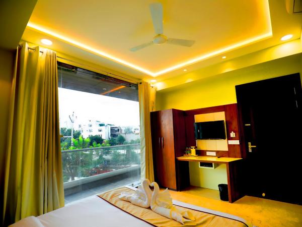 Taj Sojourn : photo 4 de la chambre chambre lit king-size - vue sur jardin