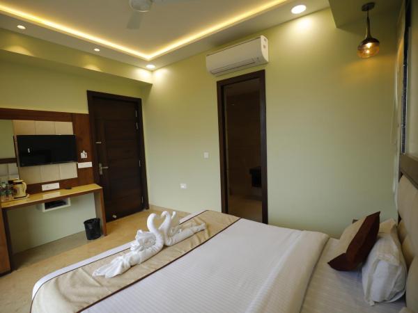 Taj Sojourn : photo 3 de la chambre chambre lit king-size - vue sur jardin