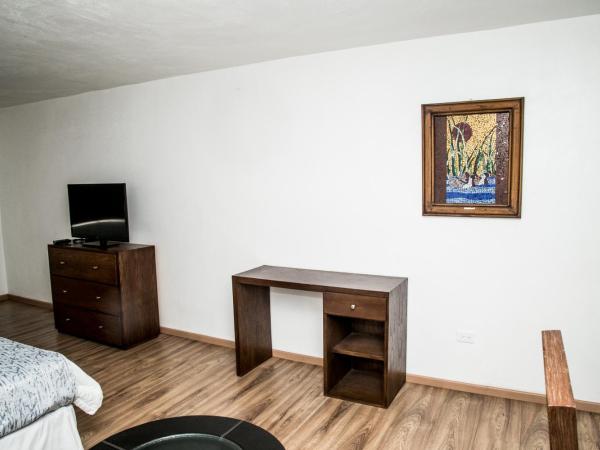 Booking Dioh : photo 7 de la chambre suite - vue sur ville