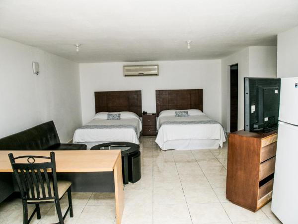Booking Dioh : photo 2 de la chambre suite double standard