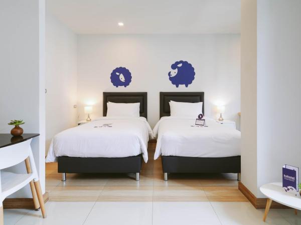 Kokotel Bangkok Sukhumvit 50 - SHA Extra Plus : photo 1 de la chambre chambre lits jumeaux