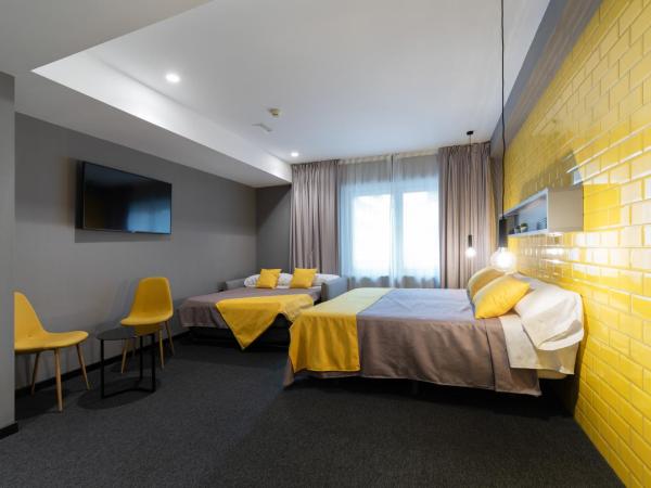 Nest Style Valencia : photo 7 de la chambre chambre double deluxe avec lit d'appoint