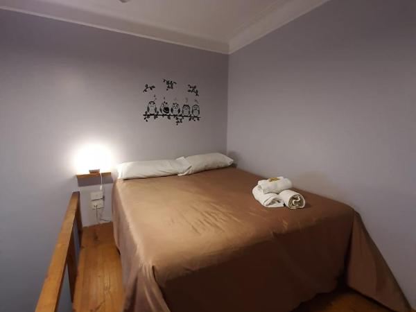 Sabatico Travelers Hostel & Guesthouse : photo 4 de la chambre chambre lit queen-size avec salle de bains commune 