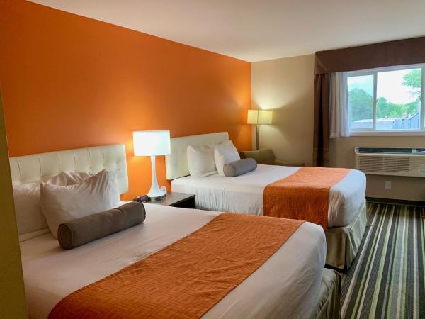 Howard Johnson by Wyndham Winnipeg West : photo 3 de la chambre chambre avec 2 lits queen-size - rez-de-chaussée - non-fumeurs/entrée privée extérieure