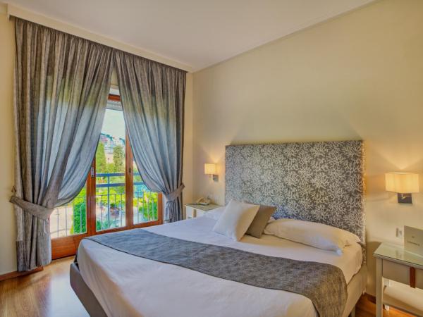 Hotel Regina : photo 1 de la chambre chambre double ou lits jumeaux - vue sur jardin
