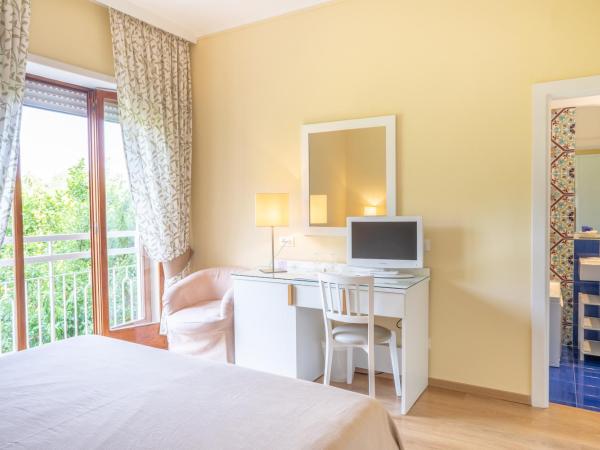Hotel Regina : photo 7 de la chambre chambre double ou lits jumeaux - vue sur jardin
