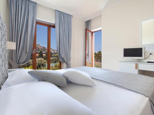 Hotel Regina : photo 2 de la chambre chambre double ou lits jumeaux - vue sur piscine