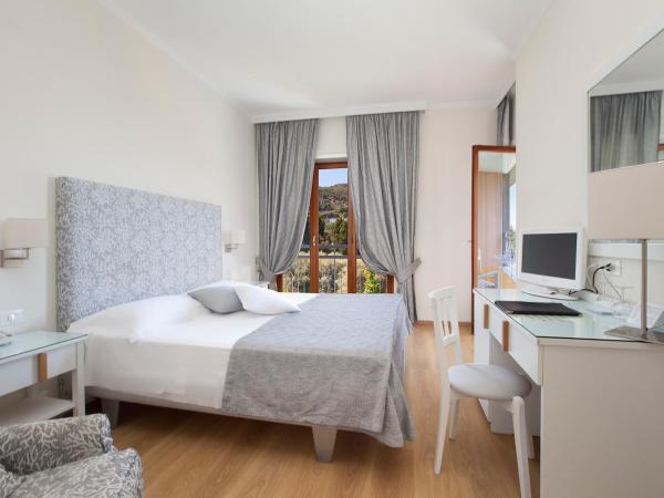 Hotel Regina : photo 3 de la chambre chambre double ou lits jumeaux - vue sur piscine