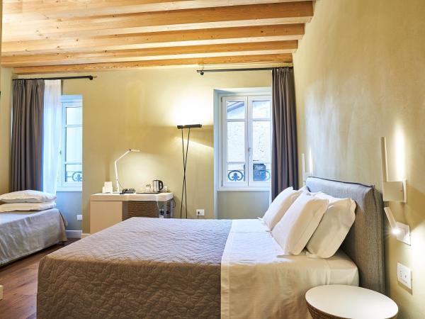 Locanda delle Mercanzie : photo 1 de la chambre chambre triple