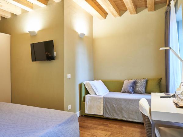 Locanda delle Mercanzie : photo 2 de la chambre chambre triple