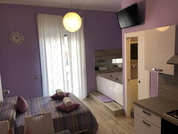 al Corso 203 : photo 2 de la chambre chambre lit king-size avec baignoire spa