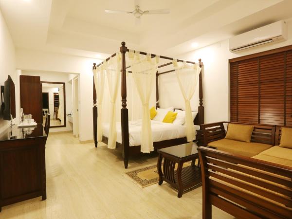 Once Upon The River, Aluva - Near Cochin International Airport : photo 4 de la chambre chambre lit king-size - vue sur jardin