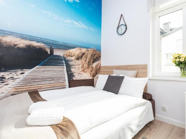 Riviera Residence Apartments : photo 1 de la chambre studio avec mezzanine