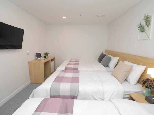 Line Hotel Myeongdong : photo 4 de la chambre chambre quadruple Économique