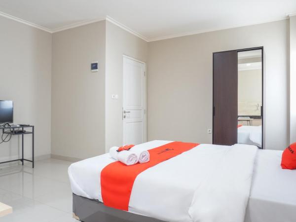 Residences by RedDoorz near MT Haryono - Minimum Stay 7 Days : photo 3 de la chambre chambre deluxe