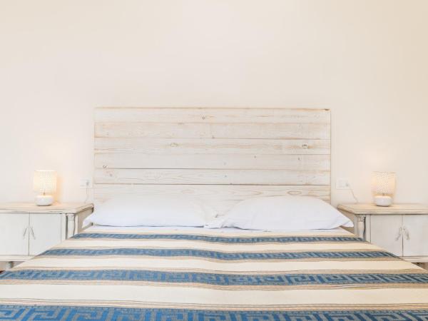 Lia Apartment : photo 1 de la chambre chambre triple avec salle de bains commune