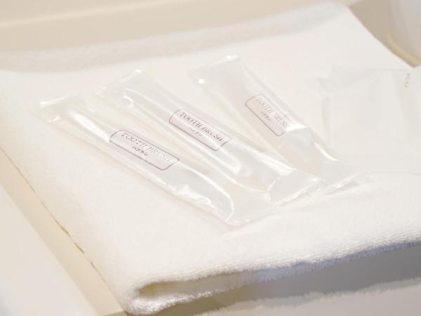 Santiago Guesthouse Hiroshima : photo 7 de la chambre chambre double avec lits superposés et salle de bains commune