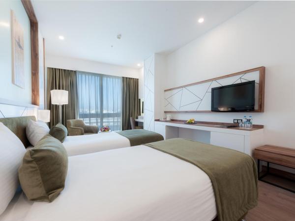 ISG Sabiha Gökçen Airport Hotel : photo 1 de la chambre chambre deluxe double ou lits jumeaux