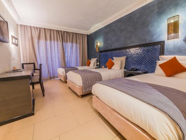 Zalagh Kasbah Hotel & Spa : photo 1 de la chambre chambre triple - vue sur jardin