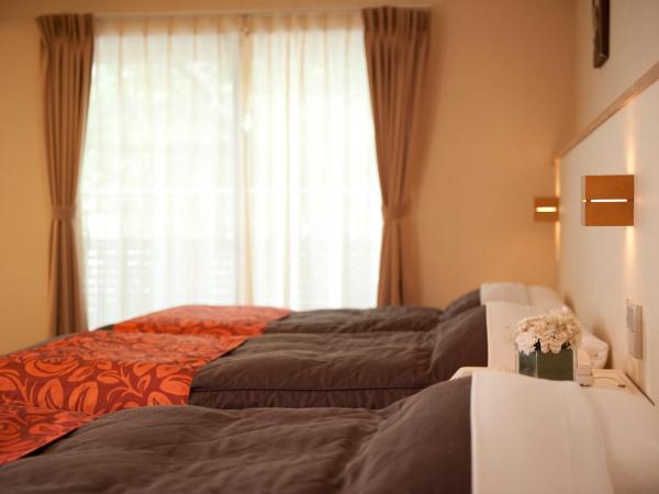 Maple Arima : photo 3 de la chambre chambre familiale avec espace tatami et salle de bains commune