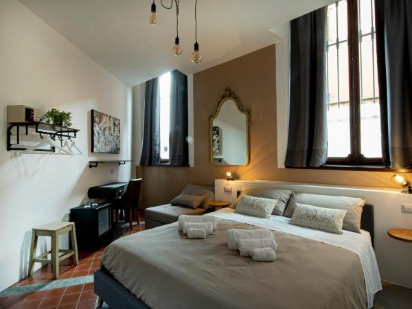 Balbis Choco Rooms : photo 1 de la chambre chambre triple deluxe