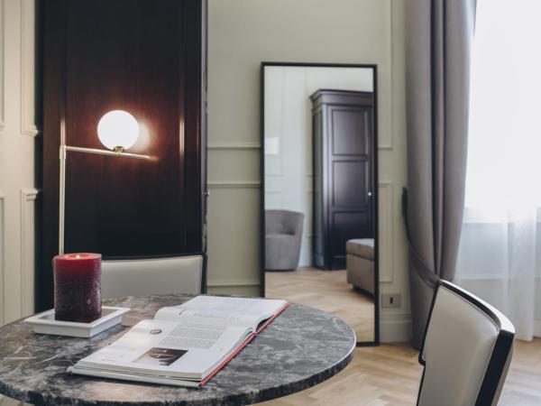 Gregorini Bingham Art Luxury Suites : photo 3 de la chambre suite supérieure lit king-size