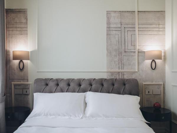Gregorini Bingham Art Luxury Suites : photo 5 de la chambre suite deluxe avec lit king-size