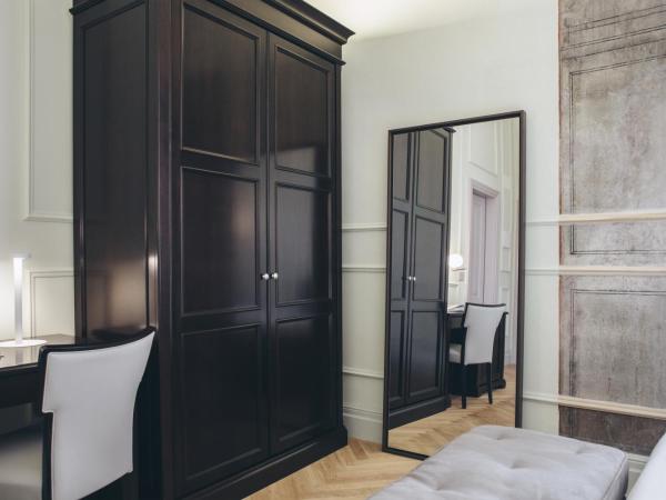 Gregorini Bingham Art Luxury Suites : photo 9 de la chambre suite deluxe avec lit king-size