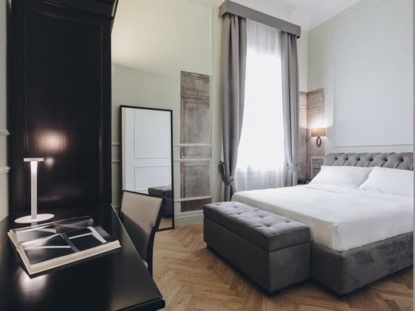 Gregorini Bingham Art Luxury Suites : photo 7 de la chambre suite deluxe avec lit king-size