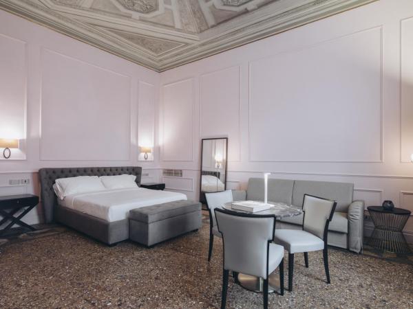 Gregorini Bingham Art Luxury Suites : photo 1 de la chambre suite supérieure lit king-size