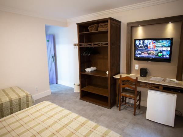 Pousada Aguas Claras : photo 2 de la chambre chambre triple classique