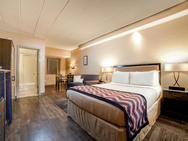 Carlton Inn Midway : photo 1 de la chambre chambre lit queen-size deluxe