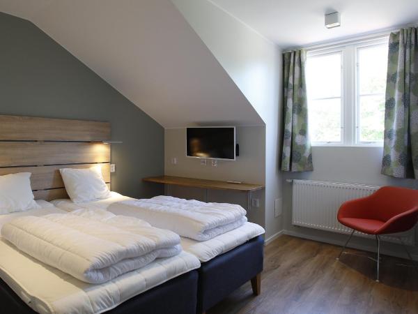 Kvibergs Vandrarhem - Hostel : photo 1 de la chambre chambre double avec salle de bains privative