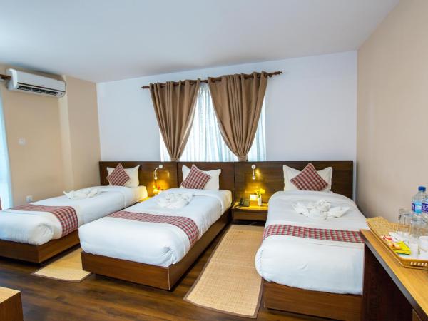 Kathmandu Suite Home : photo 4 de la chambre chambre triple deluxe