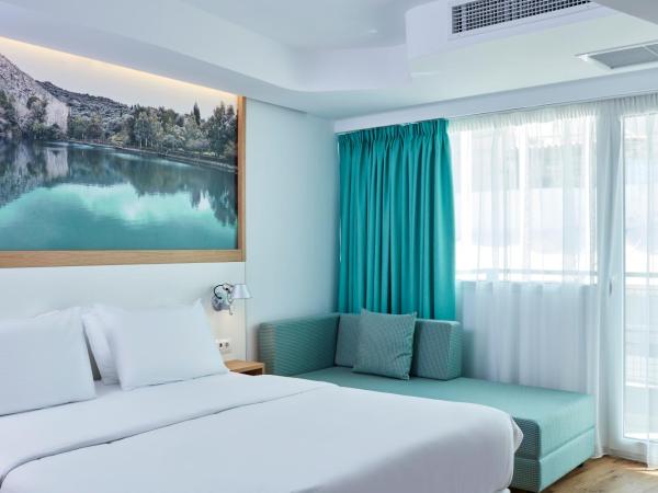 Olive Green Hotel : photo 6 de la chambre chambre triple exécutive populaire