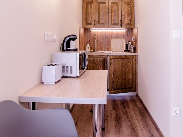 Három a Kislány Panzió : photo 7 de la chambre appartement