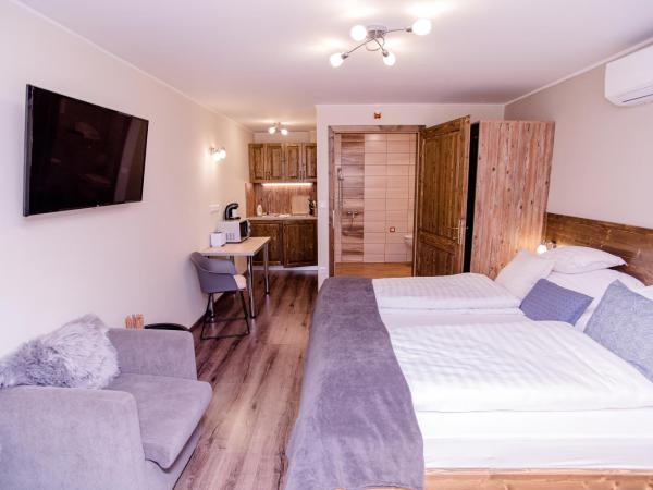 Három a Kislány Panzió : photo 1 de la chambre appartement
