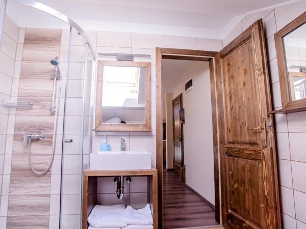 Három a Kislány Panzió : photo 2 de la chambre appartement 1 chambre