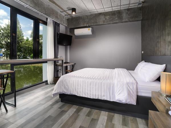 The Nichehome Waterside Living : photo 3 de la chambre chambre avec lit queen-size et salle de bains externe privative