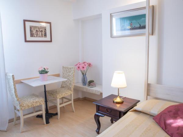 Dimora Al Doge Beato vista canale : photo 3 de la chambre chambre triple - vue sur jardin