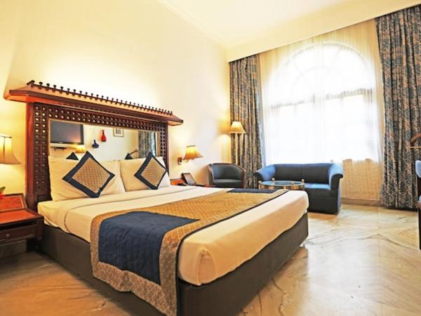 Ashok Country Resort : photo 3 de la chambre chambre double deluxe (2 adultes + 1 enfant)
