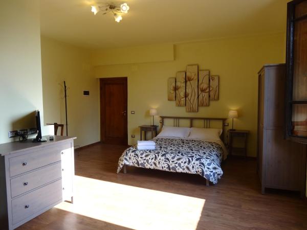 Bed & Breakfast La Tavernetta : photo 1 de la chambre chambre quadruple avec salle de bains
