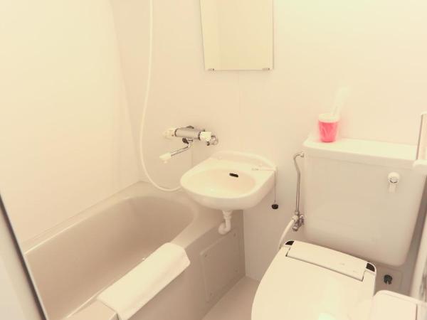 コインズホステル天神ペット宿泊可 : photo 6 de la chambre chambre lits jumeaux deluxe